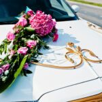 Elegance wedding limousine car with floral decoration.